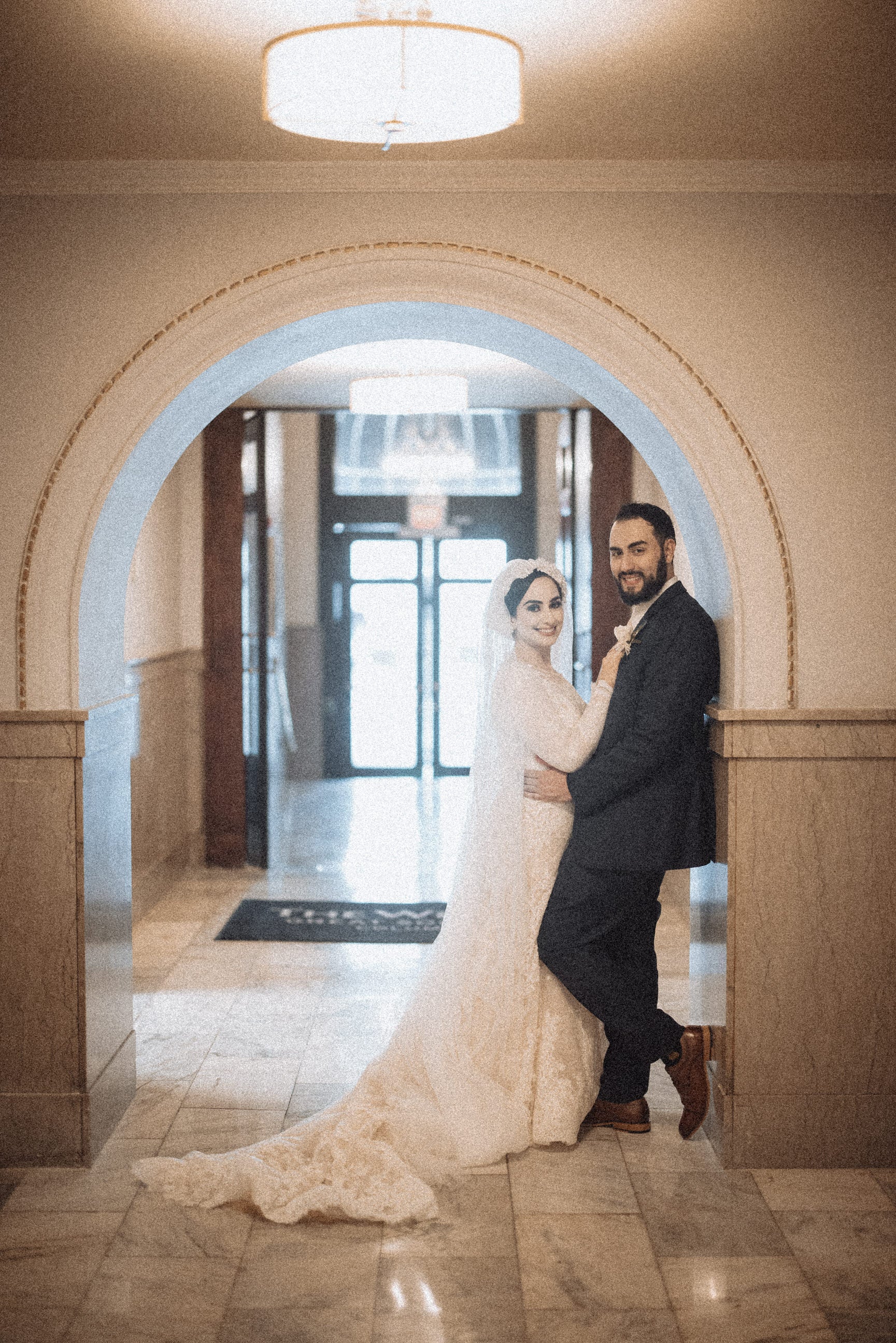 resort wedding with bride in long turban veil and hairpiece