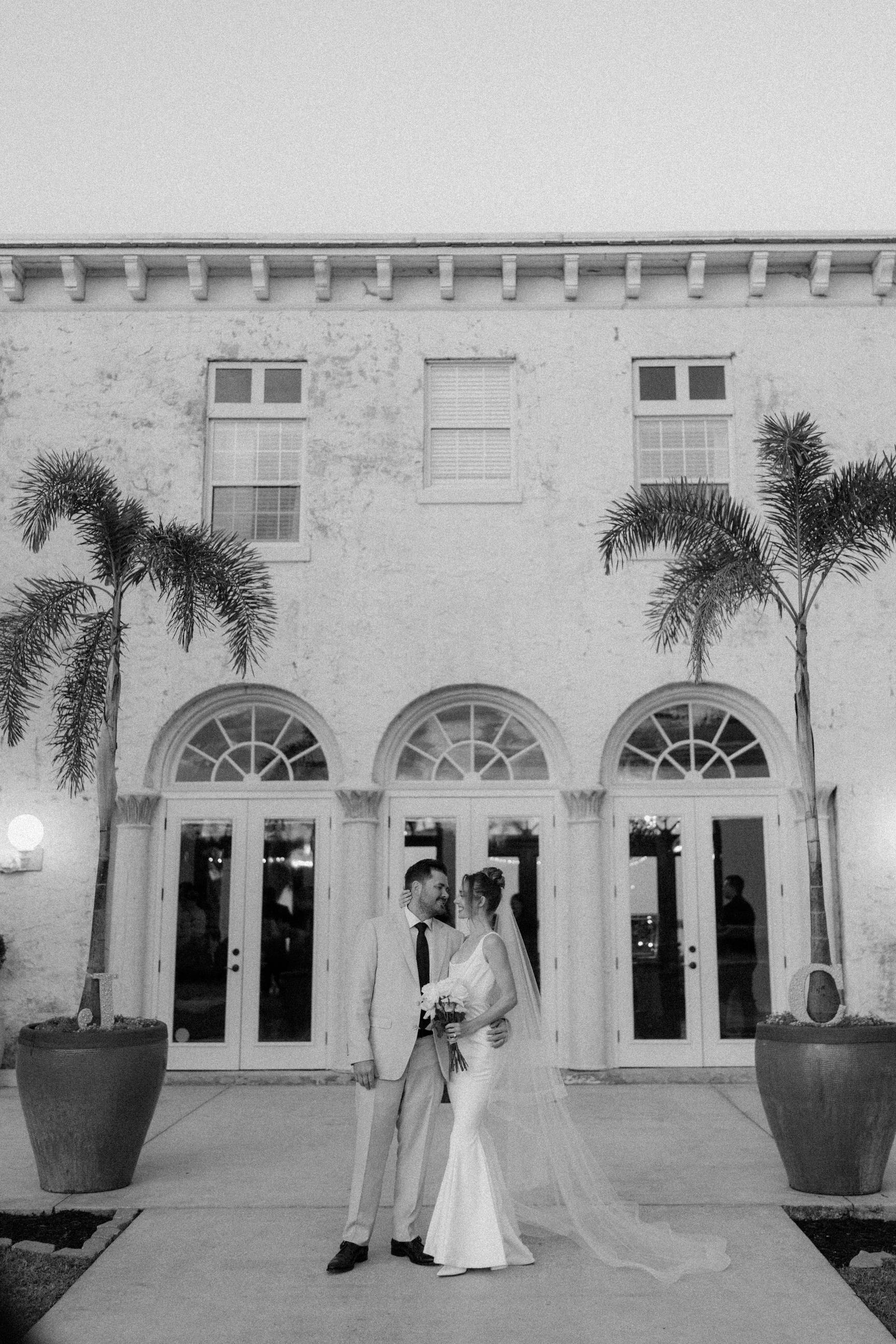 formal and classic resort desert wedding with horsehair trimmed long wedding veil