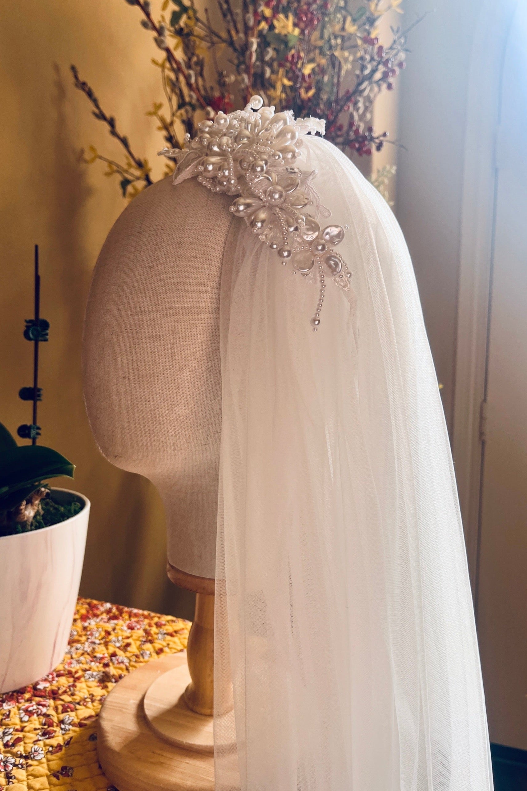 long off white bridal veil with pearl hairband and turban hat